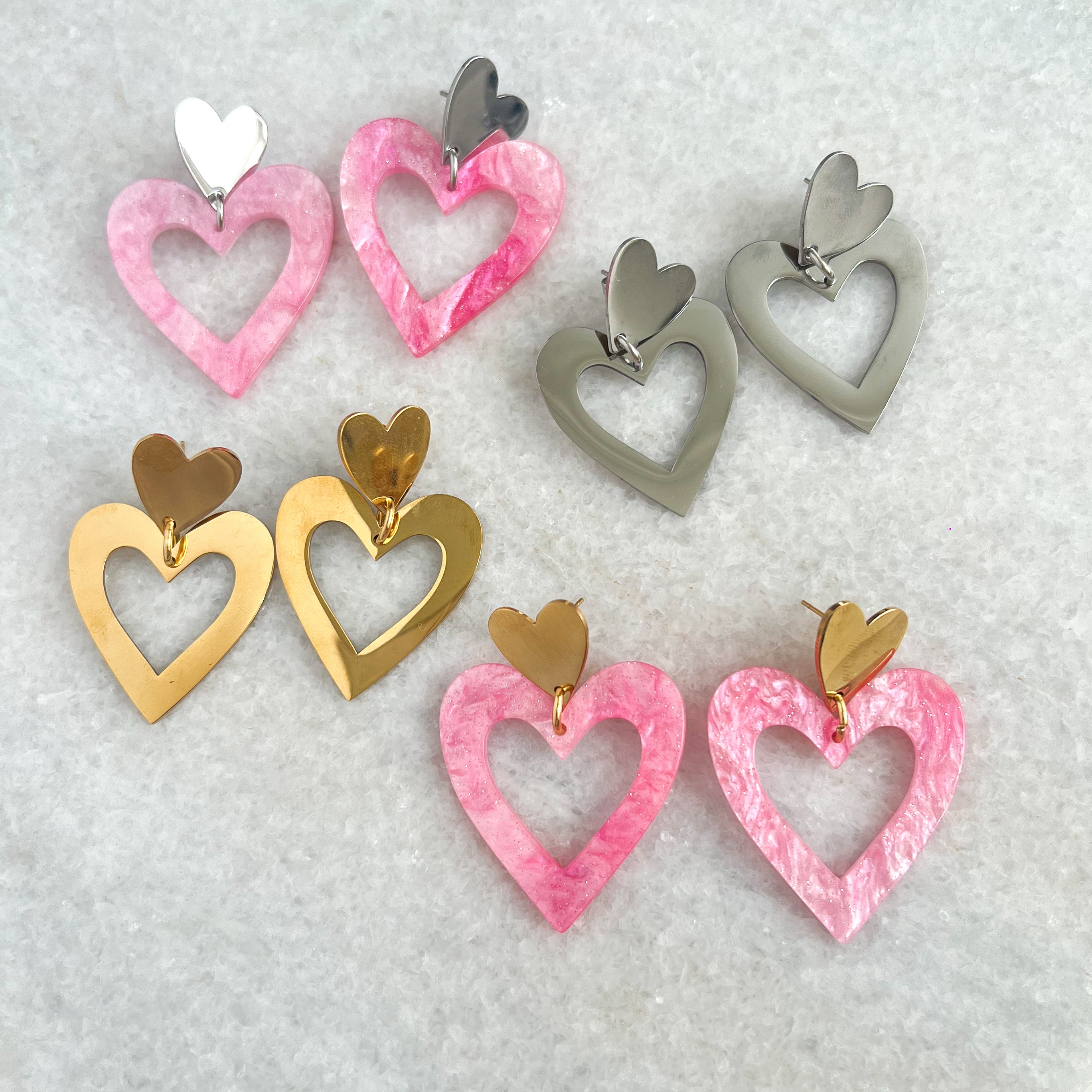 roze statement heart oorbellen - goud