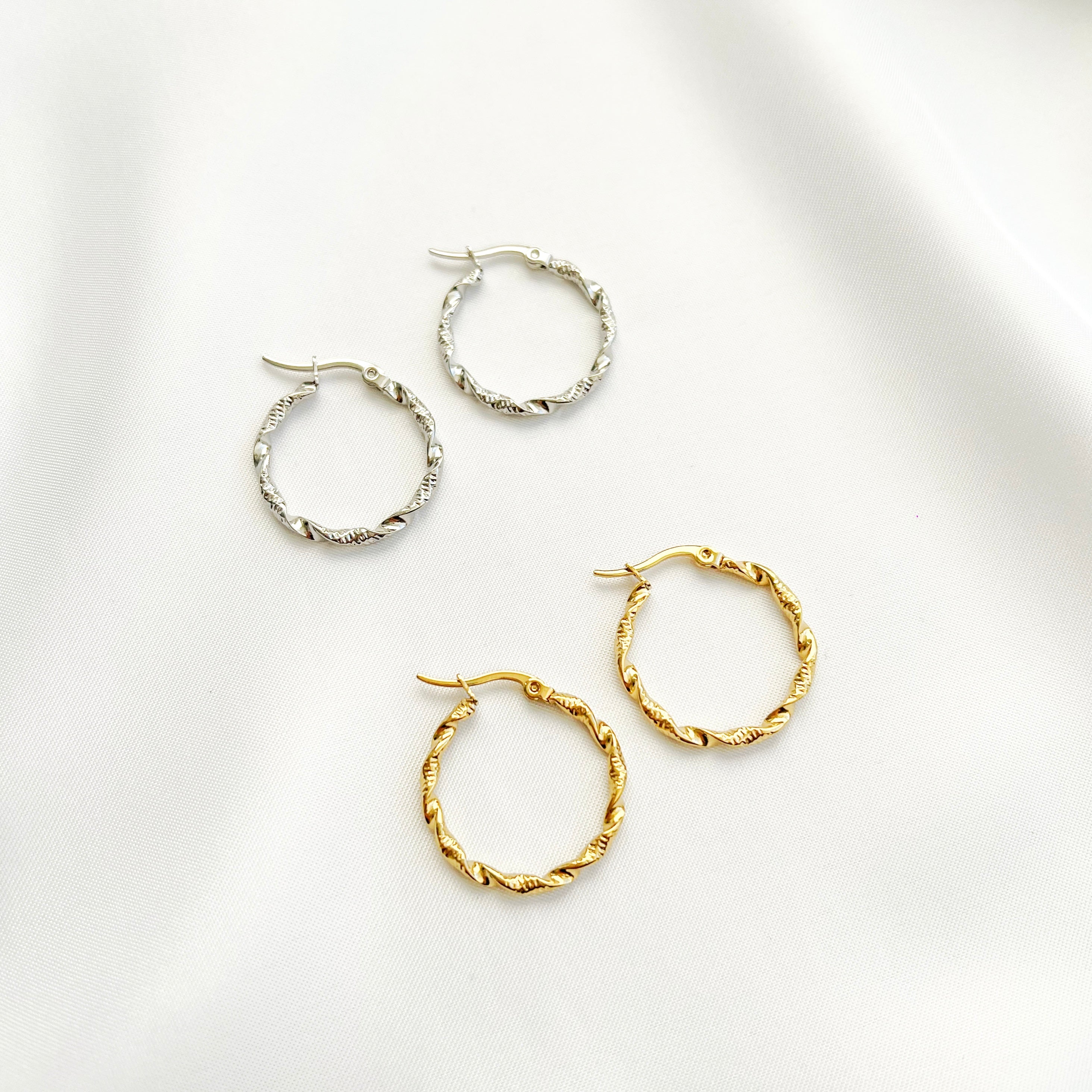 twisted hoops - goud